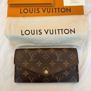 Authentic Louis Vuitton Sarah Wallet in Monogram